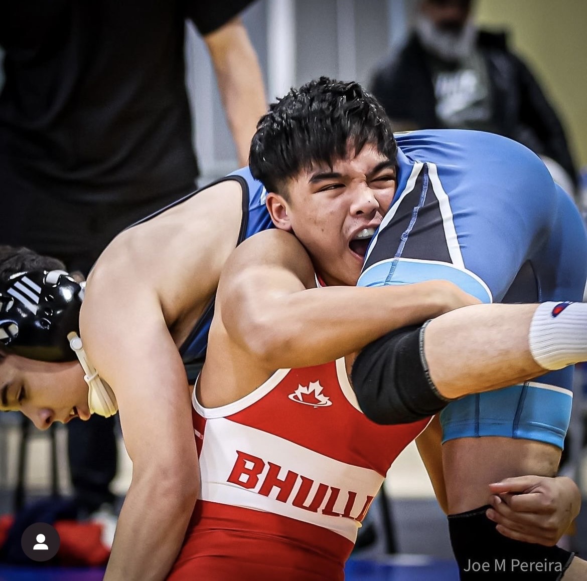 Ethan Cajigas in wrestling competition
